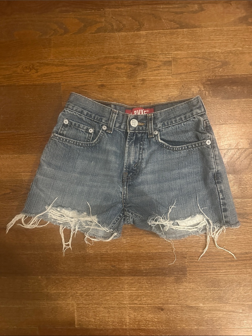 Levi's Frayed Raw Hem Denim Shorts in Washed Blue